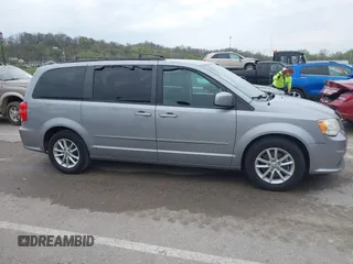 2014 Dodge Grand Caravan SXT with VIN 2C4RDGCG0ER417662, listed as a IAAI auction lot 41933279 with 156,751 mi miles and . Bid and sale history available at DreamBid. Image 13.
