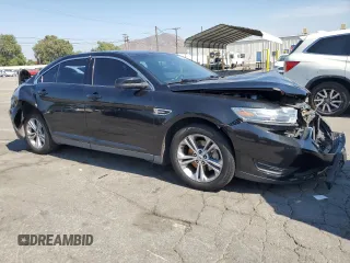 2015 Ford Taurus SEL with VIN 1FAHP2E86FG130511, listed as a Copart auction lot 60545805 with 99,215 mi miles and Salvage title. Bid and sale history available at DreamBid. Image 4.