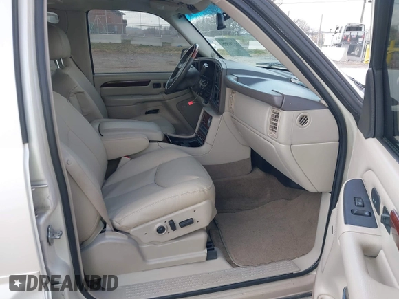2005 Cadillac Escalade z VIN 1GYEC63T55R115387, wystawiony jako IAAI lot #41791855 z przebiegiem 165 246 mil mil oraz . Historia ofert i sprzedaży dostępna na DreamBid. Obrazek 5.