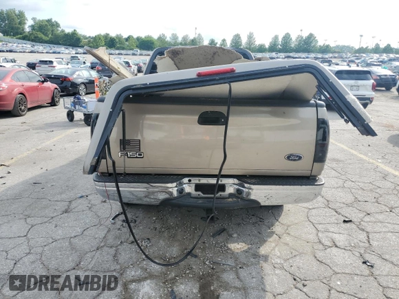 2002 Ford F-150 XL with VIN 1FTRX17L02KC02580, listed as a Copart auction lot 60859595 with 175,892 mi miles and Salvage title. Bid and sale history available at DreamBid. Image 6.