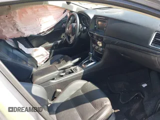 2014 Mazda 6 i Grand Touring с VIN JM1GJ1W6XE1159641, выставлен на аукционе IAAI как лот 39305628 с пробегом 107 853 миль миль и . История ставок и продаж доступна на DreamBid. Изображение 5.