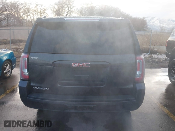 2015 GMC Yukon SLT with VIN 1GKS2BKC7FR110106, listed as a IAAI auction lot 41702260 with 108,679 mi miles. Bid and sale history available at carsss.com. Image 16.