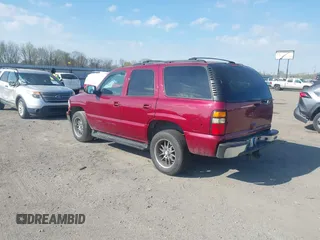 2004 Chevrolet Tahoe LS with VIN 1GNEC13T34J233824, listed as a IAAI auction lot 41877870 with 233,360 mi miles. Bid and sale history available at carsss.com. Image 3.