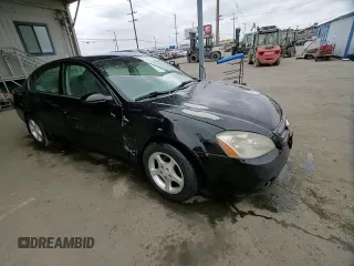 2004 Nissan Altima with VIN 1N4AL11D54C193517, listed as a Copart auction lot 56189985 with 210,451 mi miles and Salvage title. Bid and sale history available at DreamBid. Image 13.
