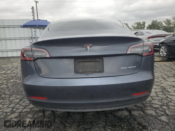 2022 Tesla Model 3 Long Range with VIN 5YJ3E1EB9NF117339, listed as a Copart auction lot 55659415 with 87,479 mi miles and Salvage Title. Bid and sale history available at DreamBid. Image 6.