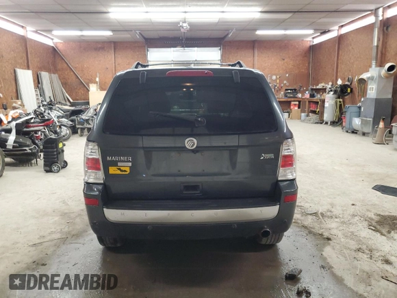 2010 Mercury Mariner Premier with VIN 4M2CN9HGXAKJ04578, listed as a Copart auction lot 63043405 with 107,803 mi miles and Salvage title. Bid and sale history available at DreamBid. Image 6.