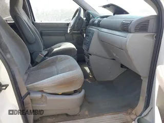2006 Ford Freestar SE z VIN 2FMZA51626BA54942, wystawiony jako IAAI lot #42133277 z przebiegiem 119 296 mil mil oraz . Historia ofert i sprzedaży dostępna na DreamBid. Obrazek 5.