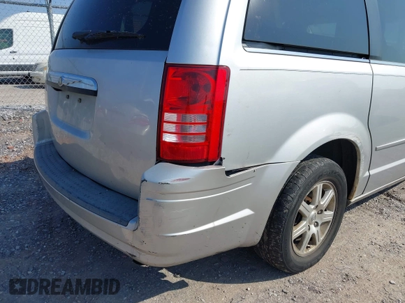 2008 Chrysler Town & Country Touring with VIN 2A8HR54P68R103852, listed as a IAAI auction lot 42588586 with 165,022 mi miles and . Bid and sale history available at DreamBid. Image 6.