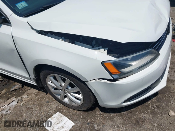 2014 Volkswagen Jetta SE with VIN 3VWD17AJ5EM437072, listed as a IAAI auction lot 42463048 with 99,030 mi miles and . Bid and sale history available at DreamBid. Image 14.
