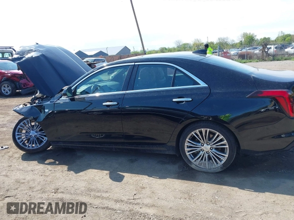 2021 Cadillac CT4 Premium Luxury z VIN 1G6DF5RK8M0121711, wystawiony jako IAAI lot #42197628 z przebiegiem Nie podano mil oraz . Historia ofert i sprzedaży dostępna na DreamBid. Obrazek 14.