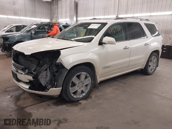 2014 GMC Acadia Denali with VIN 1GKKVTKD4EJ238869, listed as a IAAI auction lot 41957229 with 182,189 mi miles and . Bid and sale history available at carsss.com. Image 2.