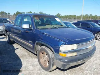 1999 Chevrolet Silverado 1500 LS with VIN 2GCEC19V1X1144026, listed as a IAAI auction lot 41398552 with 216,068 mi miles. Bid and sale history available at carsss.com. Image 1.