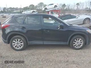 2014 Mazda CX-5 Sport with VIN JM3KE4BE4E0426931, listed as a IAAI auction lot 42055582 with 121,418 mi miles. Bid and sale history available at carsss.com. Image 13.