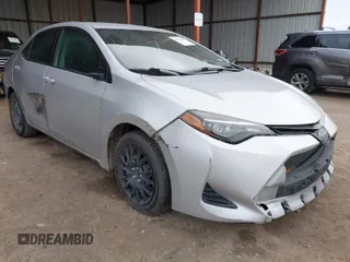 2019 Toyota Corolla L z VIN 5YFBURHE9KP939397, wystawiony jako IAAI lot #41520088 z przebiegiem 100 277 mil mil oraz . Historia ofert i sprzedaży dostępna na DreamBid. Obrazek 1.