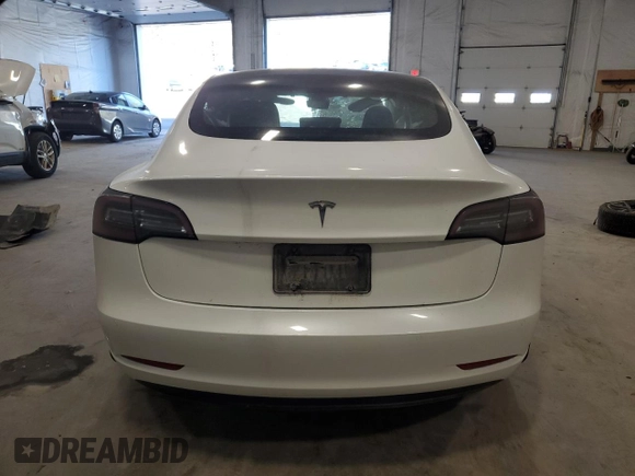 2021 Tesla Model 3 Standard Range Plus z VIN 5YJ3E1EA7MF986964, wystawiony jako Copart lot #55119995 z przebiegiem Nie podano mil oraz Szkody całkowita. Historia ofert i sprzedaży dostępna na DreamBid. Obrazek 6.