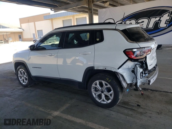 2025 Jeep Compass Latitude with VIN 3C4NJDBNXST547107, listed as a Copart auction lot 56147275 with 8,460 mi miles and Salvage title. Bid and sale history available at DreamBid. Image 2.