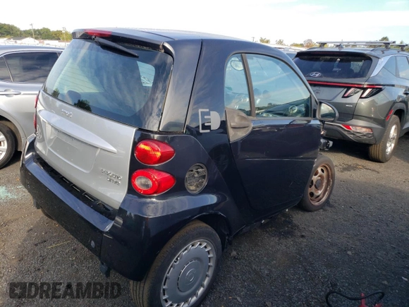 2013 Smart fortwo Passion z VIN WMEEJ9AA1DK717534, wystawiony jako Copart lot #73832094 z przebiegiem Nie podano mil oraz Tytuł czysty. Historia ofert i sprzedaży dostępna na DreamBid. Obrazek 3.