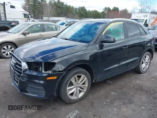 2017 Audi Q3 Premium z VIN WA1ECCFS4HR009874, wystawiony jako IAAI lot #41983904 z przebiegiem 74 785 mil mil oraz . Historia ofert i sprzedaży dostępna na DreamBid. Obrazek 18.