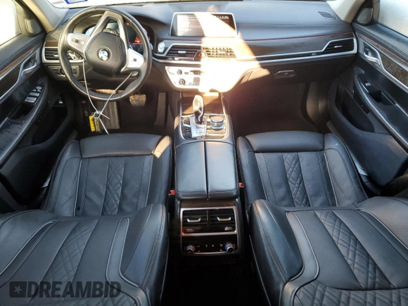 2020 BMW 7 Series 740i with VIN WBA7T2C0XLCE02429, listed as a Copart auction lot 42574835 with 73,970 mi miles and Salvage Title. Bid and sale history available at carsss.com. Image 8.