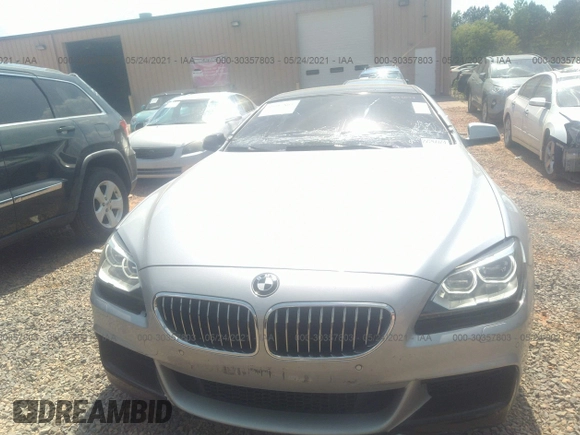 2015 BMW 6 Series 640i z VIN WBA6A0C57FGB53750, wystawiony jako IAAI lot #30357803 z przebiegiem 59 462 mil mil oraz . Historia ofert i sprzedaży dostępna na DreamBid. Obrazek 6.
