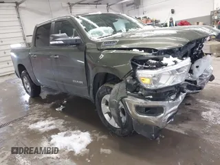 2021 Ram 1500 Big Horn with VIN 1C6RRFFGXMN614252, listed as a IAAI auction lot 41540747 with 34,557 mi miles and . Bid and sale history available at DreamBid. Image 1.