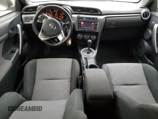 2014 Scion tC z VIN JTKJF5C7XE3079538, wystawiony jako Copart lot #85018414 z przebiegiem 136 905 mil mil oraz Czysty tytuł • Clean title. Historia ofert i sprzedaży dostępna na DreamBid. Obrazek 8.