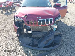 2019 Jeep Cherokee Altitude with VIN 1C4PJMLXXKD223718, listed as a IAAI auction lot 42043756 with 62,073 mi miles and . Bid and sale history available at DreamBid. Image 6.