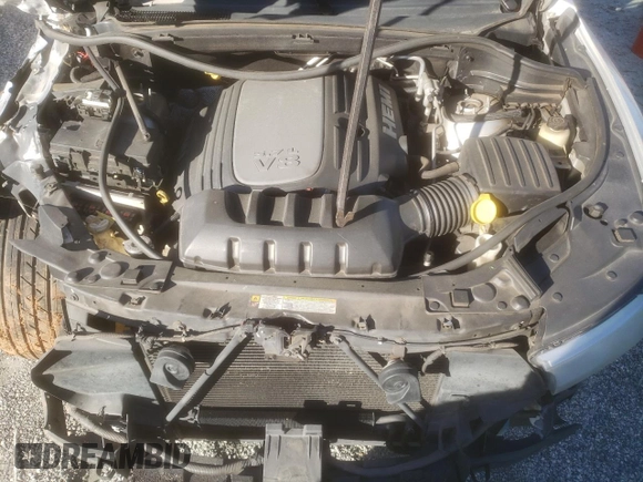 2011 Dodge Durango Citadel z VIN 1D4SE5GT2BC695853, wystawiony jako Copart lot #49476255 z przebiegiem 136 397 mil mil oraz Szkoda całkowita • Salvage title. Historia ofert i sprzedaży dostępna na DreamBid. Obrazek 13.