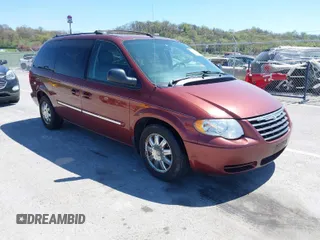 2007 Chrysler Town & Country LWB Touring with VIN 2A8GP54L17R267832, listed as a IAAI auction lot 42016470 with 153,902 mi miles. Bid and sale history available at carsss.com. Image 1.