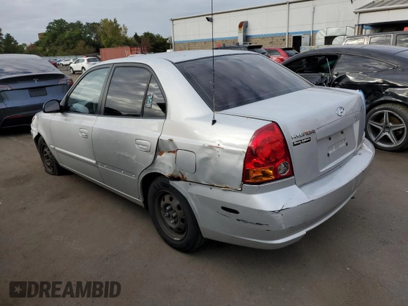 2005 Hyundai Accent GLS with VIN KMHCG45C45U631414, listed as a Copart auction lot 73963814 with 106,617 mi miles and Salvage Title. Bid and sale history available at carsss.com. Image 2.