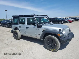 2023 Jeep Wrangler Sport with VIN 1C4HJXDG3PW670651, listed as a Copart auction lot 54013405 with 19,395 mi miles and Clean Title. Bid and sale history available at DreamBid. Image 4.