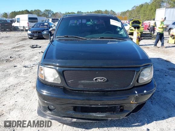 2002 Ford F-150 Harley Davidson with VIN 1FTRW07312KC24102, listed as a IAAI auction lot 41591917 with 1 mi miles. Bid and sale history available at carsss.com. Image 13.