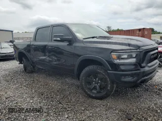 2020 Ram 1500 Rebel with VIN 1C6SRFLT5LN408810, listed as a Copart auction lot 56894725 with 49,089 mi miles and Salvage title. Bid and sale history available at DreamBid. Image 4.