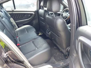 2015 Ford Taurus SEL z VIN 1FAHP2E88FG136181, wystawiony jako IAAI lot #42681490 z przebiegiem 230 000 mil mil oraz . Historia ofert i sprzedaży dostępna na DreamBid. Obrazek 8.
