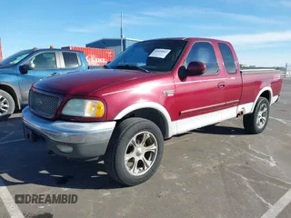 2003 Ford F-150 XL with VIN 1FTRX18L13NA55281, listed as a IAAI auction lot 41694883 with 101,777 mi miles. Bid and sale history available at carsss.com. Image 6.