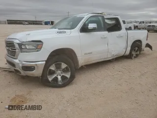 2023 Ram 1500 Laramie with VIN 1C6SRFJT7PN521084, listed as a Copart auction lot 51503625 with 48,971 mi miles and Salvage title. Bid and sale history available at DreamBid. Image 1.