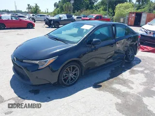 2021 Toyota Corolla LE with VIN 5YFEPMAE1MP247493, listed as a IAAI auction lot 40090331 with 111,994 mi miles. Bid and sale history available at carsss.com. Image 2.
