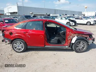 2018 Ford Focus Titanium with VIN 1FADP3J20JL281141, listed as a IAAI auction lot 42437424 with 113,499 mi miles and . Bid and sale history available at DreamBid. Image 14.