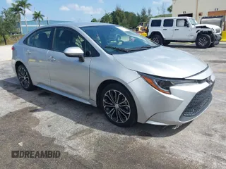 2020 Toyota Corolla LE with VIN JTDEPRAEXLJ023560, listed as a IAAI auction lot 41985501 with 59,529 mi miles. Bid and sale history available at carsss.com. Image 1.