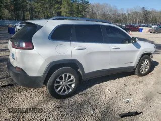 2019 Jeep Cherokee Latitude with VIN 1C4PJLCB7KD370156, listed as a Copart auction lot 50612335 with 101,499 mi miles and Salvage Title. Bid and sale history available at carsss.com. Image 3.