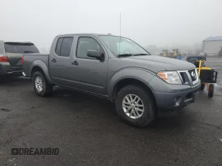 2017 Nissan Frontier SV with VIN 1N6AD0EV7HN723725, listed as a Copart auction lot 61253905 with 58,163 mi miles and Salvage title. Bid and sale history available at DreamBid. Image 4.