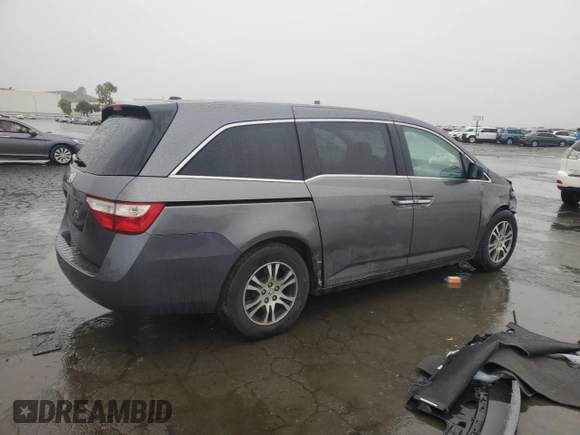 2011 Honda Odyssey EX-L with VIN 5FNRL5H64BB050425, listed as a Copart auction lot 49101795 with 192,238 mi miles and Salvage Title. Bid and sale history available at DreamBid. Image 3.