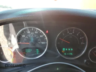 2011 Jeep Wrangler Unlimited Rubicon with VIN 1J4HA6H12BL584493, listed as a Copart auction lot 61765735 with 151,175 mi miles and Salvage title. Bid and sale history available at DreamBid. Image 9.