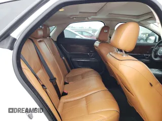 2016 Jaguar XJ R-Sport z VIN SAJWJ1CD6G8W00627, wystawiony jako Copart lot #38892104 z przebiegiem 106 313 mil mil oraz . Historia ofert i sprzedaży dostępna na DreamBid. Obrazek 10.