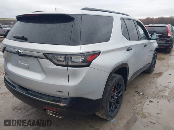 2020 Chevrolet Traverse Premier with VIN 1GNEVKKW4LJ284338, listed as a IAAI auction lot 41912758 with 74,496 mi miles and . Bid and sale history available at DreamBid. Image 4.