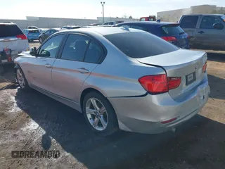 2014 BMW 3 Series 320i with VIN WBA3B1G58ENS81101, listed as a IAAI auction lot 38950717 with 1 mi miles. Bid and sale history available at carsss.com. Image 3.