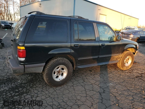 1997 Ford Explorer XL with VIN 1FMDU34E8VUC95969, listed as a Copart auction lot 83269784 with 174,035 mi miles and Salvage title. Bid and sale history available at DreamBid. Image 3.