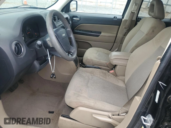 2009 Jeep Patriot Sport z VIN 1J4FT28B39D147223, wystawiony jako Copart lot #53913695 z przebiegiem 132 432 mil mil oraz Szkoda całkowita • Salvage title. Historia ofert i sprzedaży dostępna na DreamBid. Obrazek 7.