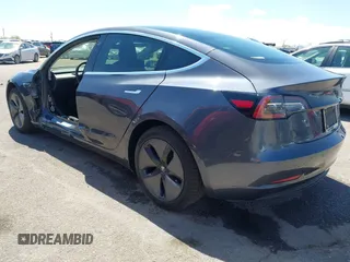 2019 Tesla Model 3 Long Range with VIN 5YJ3E1EB9KF386047, listed as a IAAI auction lot 42215362 with 41,246 mi miles and . Bid and sale history available at DreamBid. Image 3.
