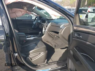 2015 Cadillac SRX with VIN 3GYFNAE38FS622913, listed as a IAAI auction lot 41590242 with 114,062 mi miles and . Bid and sale history available at DreamBid. Image 5.